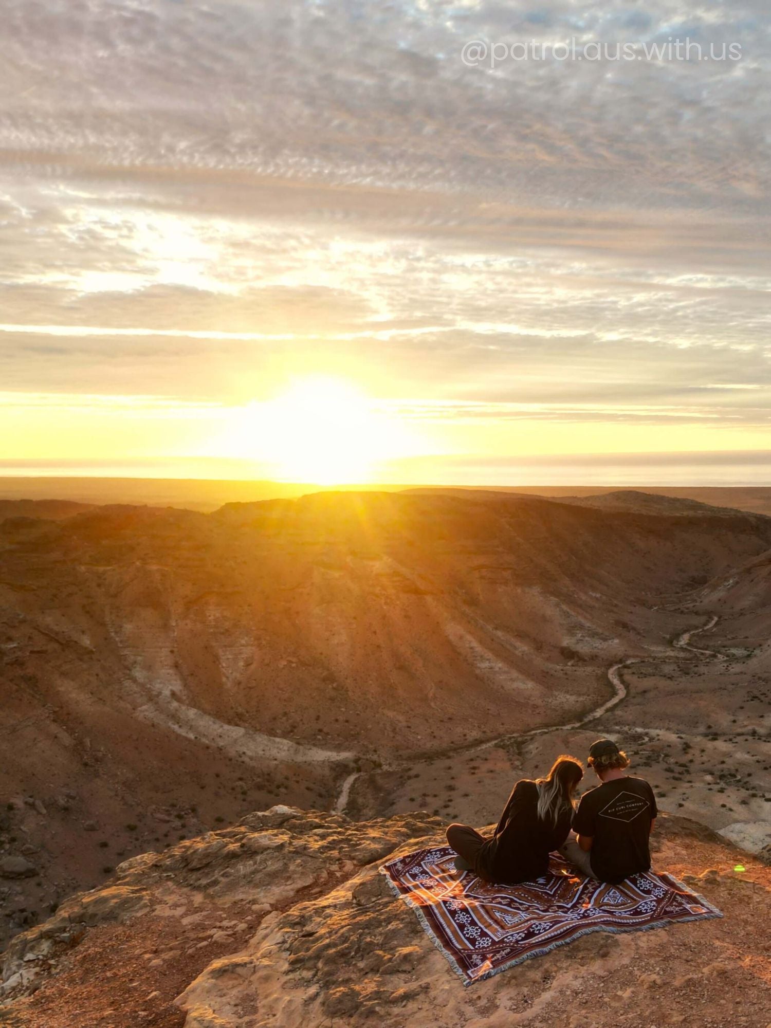 Desert Night throw rug and picnic blanket in canyon Western Australia. Views of the sunset over horizon. Shades of brown, boho rug, must-have van life accessory