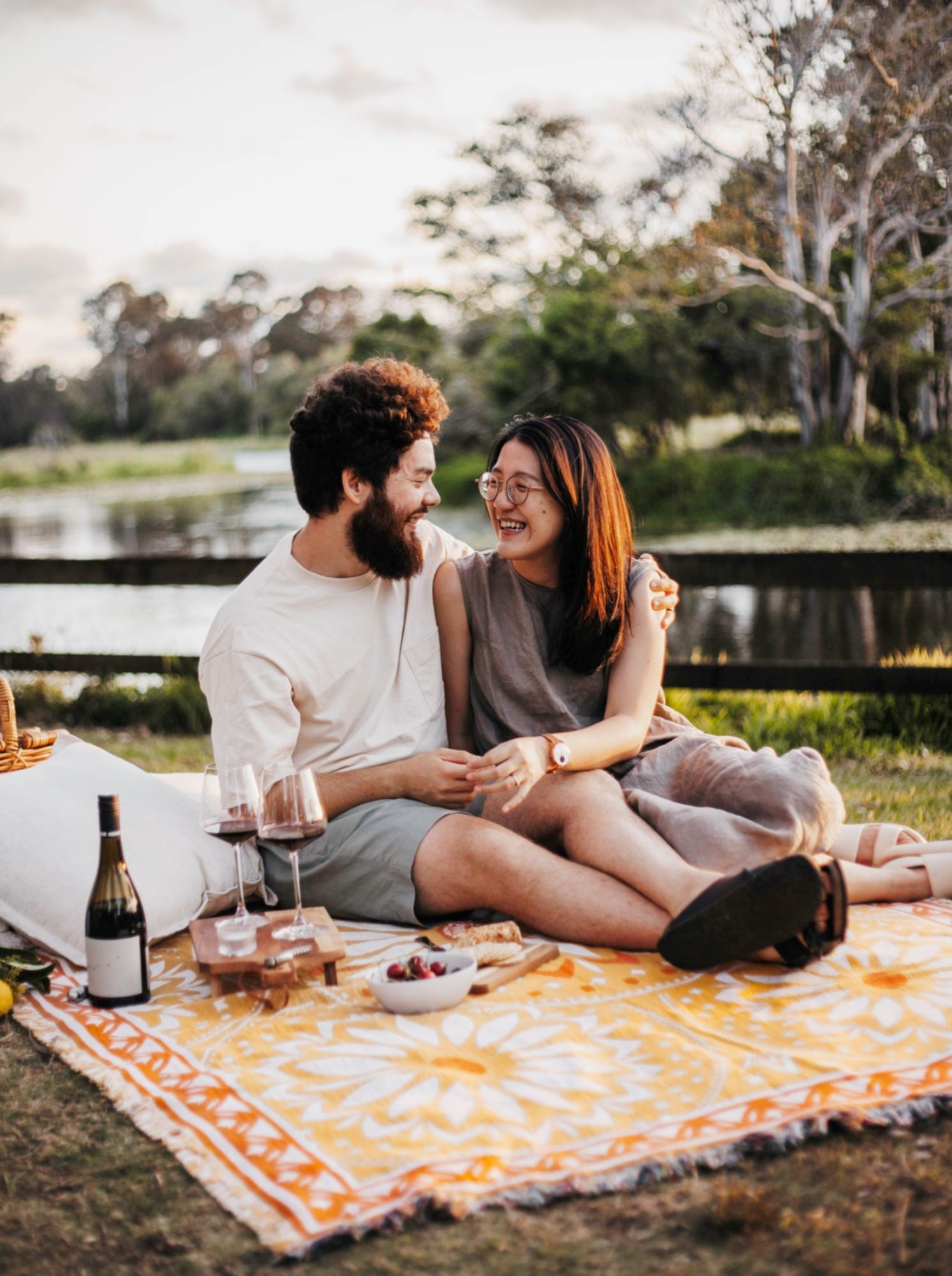 Yellow and orange throw rug perfect for self-care. XL size to fit over queen bed or family picnic. Designed in Australia - Better Days picnic rug for couples dates or family time.  