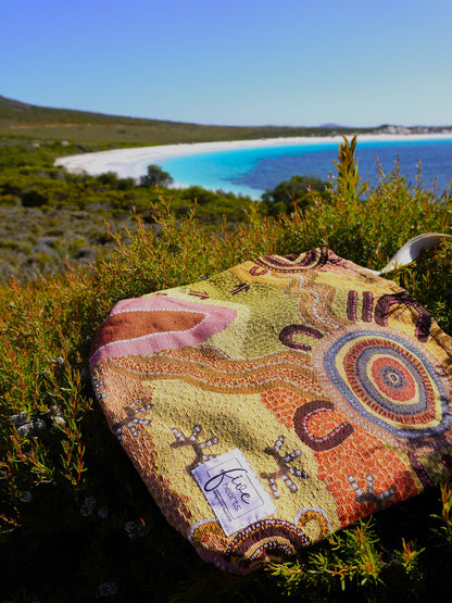 Coming Home Indigenous art tote bag. Woven from recycled fabrics. First Nations art, designed in Aus.